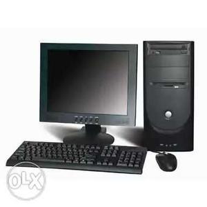 Black Computer Monitor, Keyboard, Mouse, And Tower