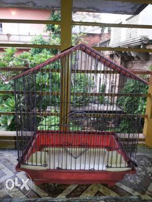 Red And Black Bird Cage