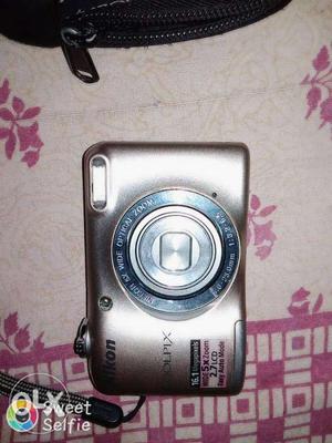 Silver Nikon Coolpix Point-and-shoot Camera