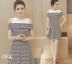 Girl's White And Black Stripe Sleeveless Onepiece.