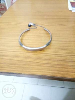 Gray And Silver Bluetooth Neckband