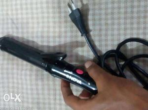 Never used hair straightener+curler for sale at