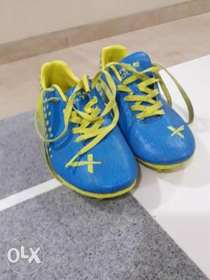 Pair Of Blue-and-yellow Nike Running Shoes