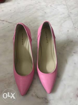 Pair Of Pink Pointed-toe Heeled Shoes