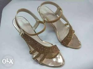 Pair Of Women's Gold-and-silver Leather Sandals