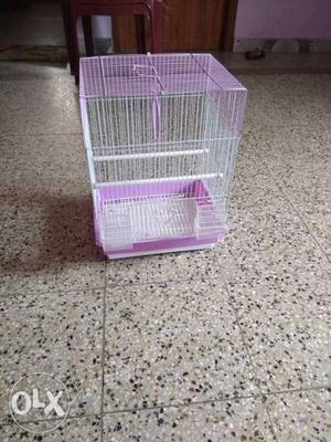 Purple And White Metal Wire Birdcage