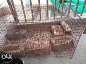 Red animal cage
