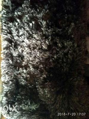 Shaggy rug 3'*5'. grey color. less used. very