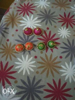 Three Pairs Of Orange-pink-and-green Earrings