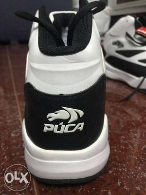 White And Black Puca High-Top Sneakers
