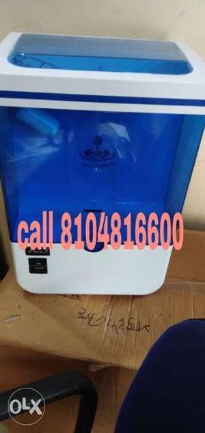 White And Blue Plastic Container