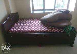 4X6 Bed with mattress and a chair