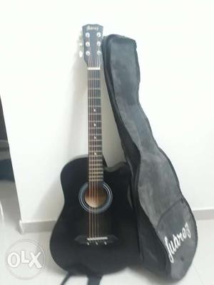 Acoustic guitar with bag