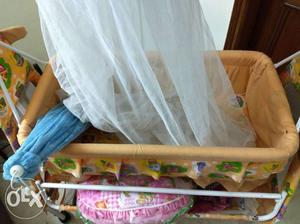 Baby Cradle in pristine condition with a mosquito