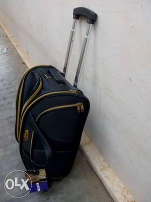 Black And Yellow Luggage Bag