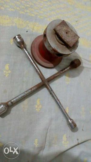 Car jack and wheel cross wrench in good working
