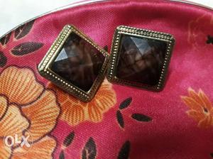 Pair Of Silver-colored And Black Cufflinks
