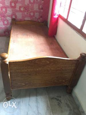 Single wooden bed, 2 Yrs old