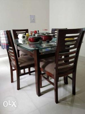 Teakwood dining table + 4 chairs. Custom built