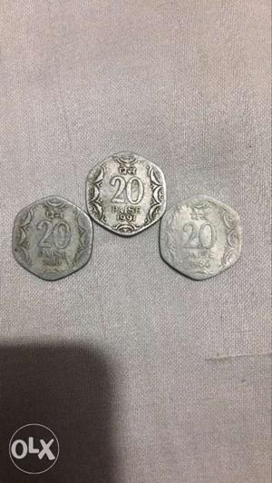 Three 20 Silver-colored Indian Paise Coins