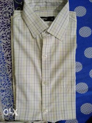 100% cotton checked shirt. Size small(39cm)