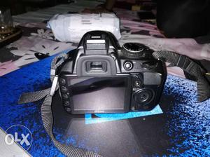 Black And Gray Canon DSLR Camera