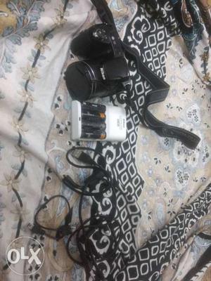 Coolpix Nikon SLR with bag