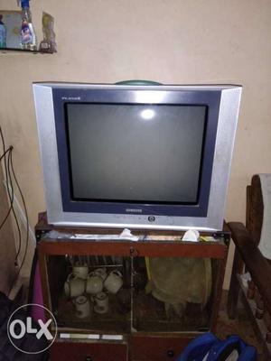 Gray CRT Television With Remote