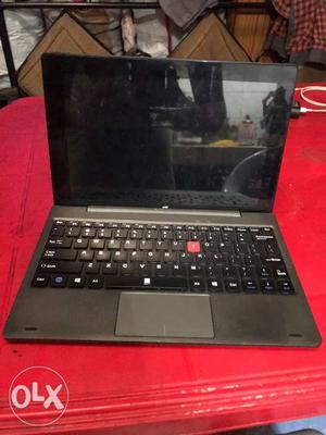 IBall laptop! With 1 gb ram n 32gb rom! U can as