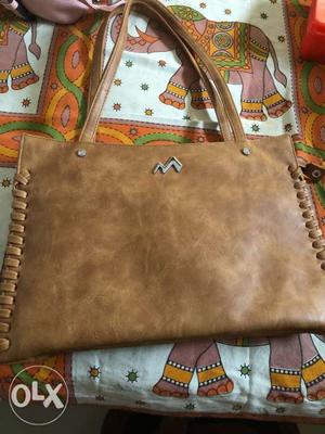Metro handbag real leather in mustard color