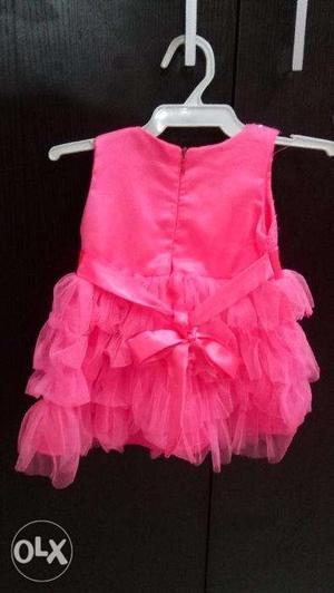 Nice pink color frock for baby upto 1 year