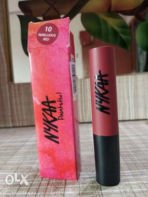 Nykaa Paintstix in shade Rebellious Red. actually