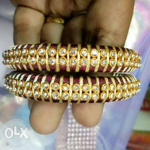 Two Maroon-and-gold Bangle Bracelets