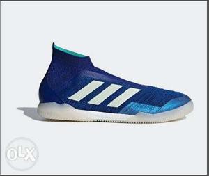 Unpaired Blue And White Adidas Sneaker