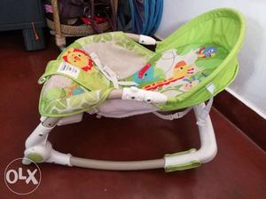 Unused Baby's Green And White Bouncer
