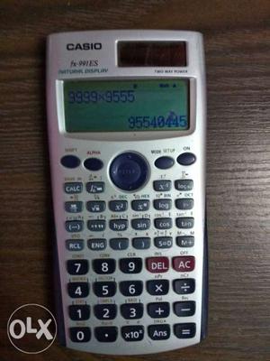 White And Black Casio Calculator
