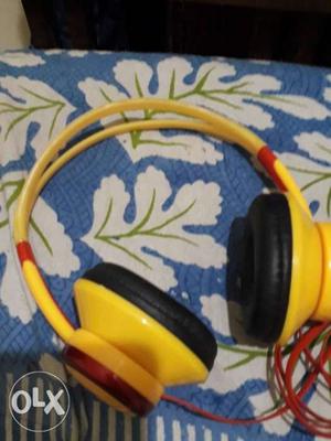 Yellow And Black Corded Headphones