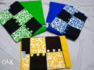 Black, Yellow, And Blue Floral Textile