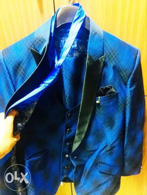 Blue designer suit, brand new