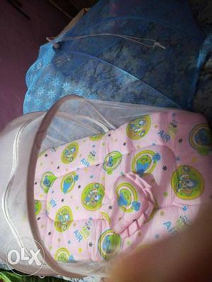 Brand new bed and mosquito net for 0 -6 months old baby