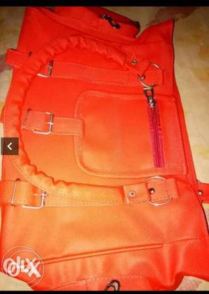 Bright Red Colour Handbag..spacious and unused