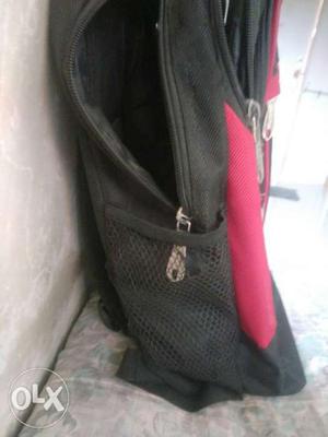 COOL™ bagpack black and red color.