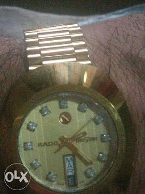 Haat ki ghadi riest watch golden RADO WITH DIOMOND