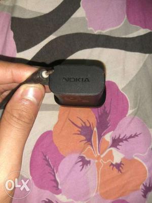 Nokia original charger hai patla pin wala jisko