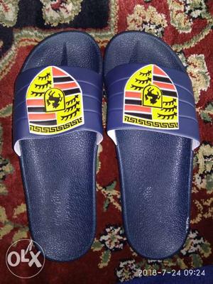 Pair Of Blue-and-yellow Adidas Slide Sandals