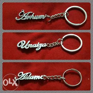 Three Silver-colored Personalized Keychains