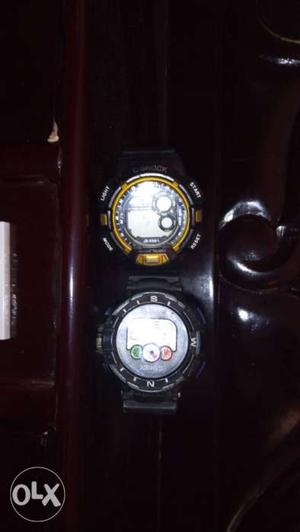 Two Round Digital Watches