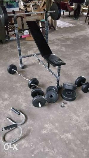 Black Bench Press with 50 of dumbels and bar