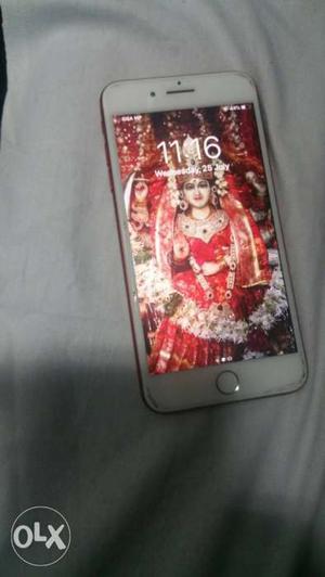 I phone 7 plus 128 gb 14 month old red version.