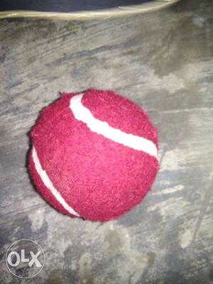 Red And White Tennis Ball